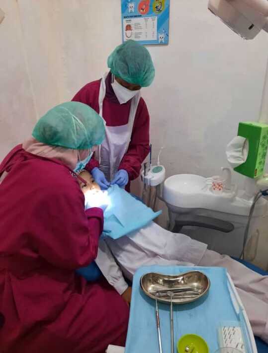 gigi palsu permanen